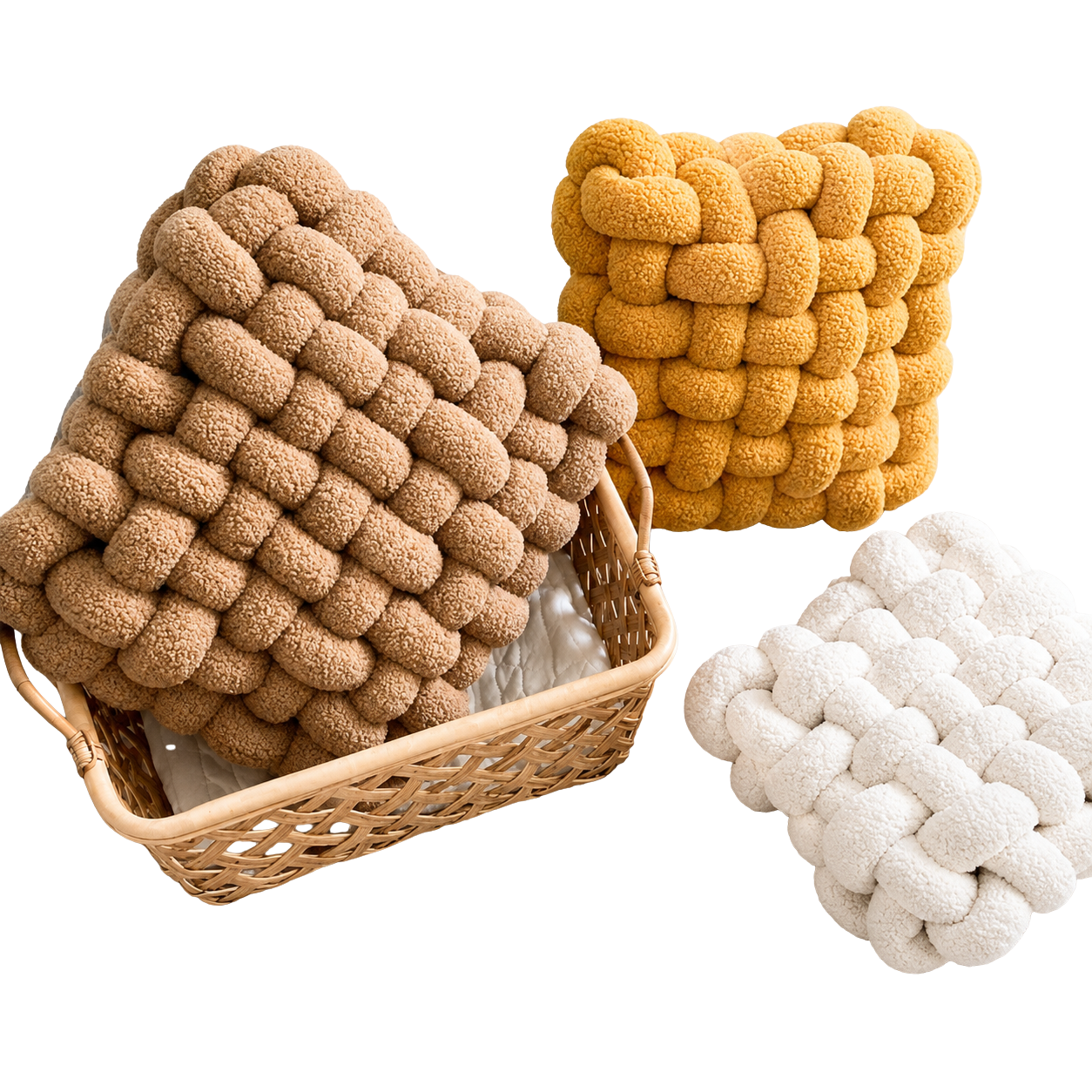 Three woven baskets in brown, yellow, and white on a white background